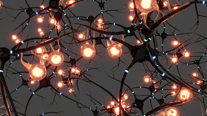 Abstract illustration of neurons and their branching connections rendered in cool light against dark